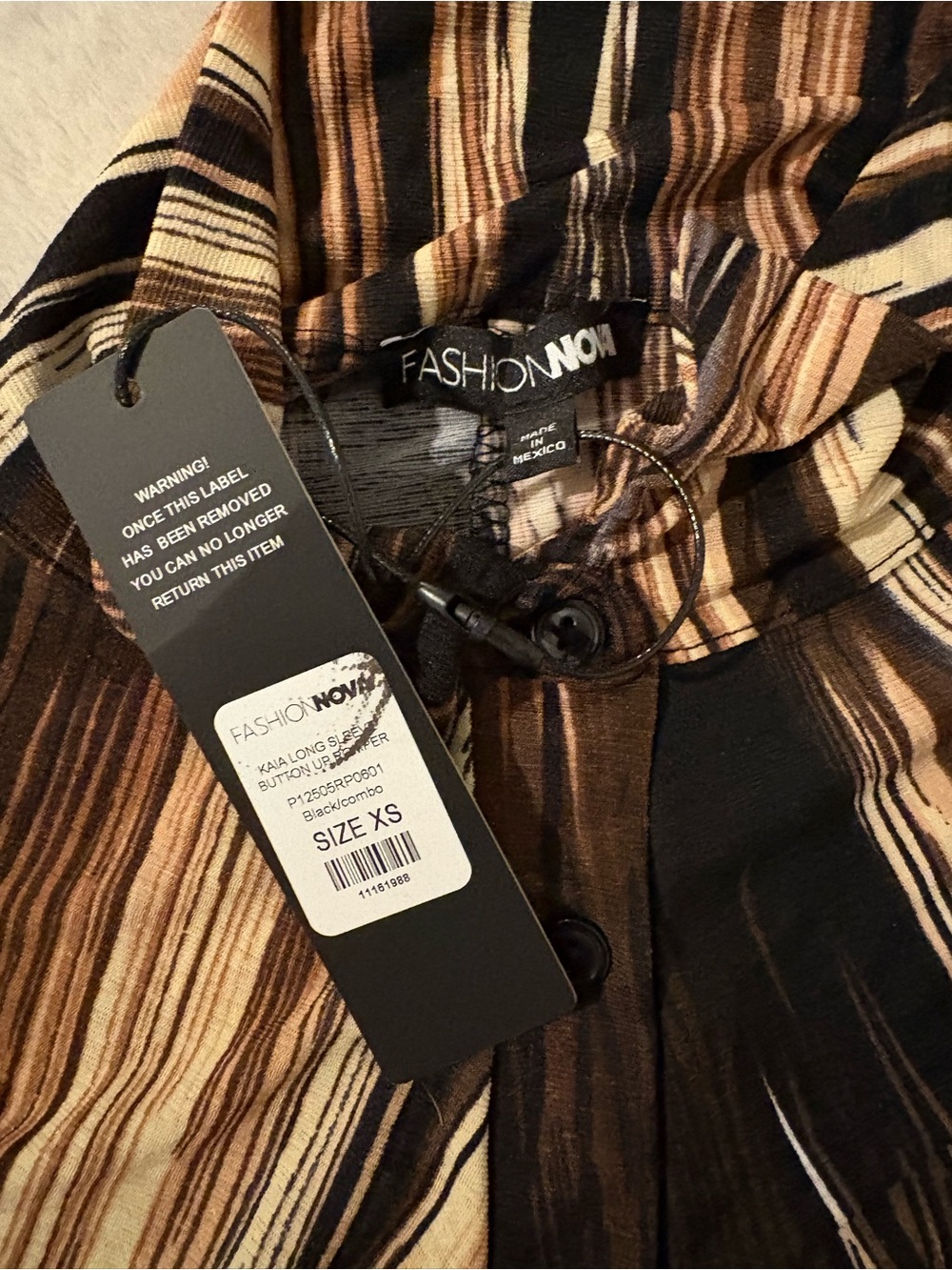 Fashion Nova Kaila Long Sleeve Button Up Romper Brown Black Abstract